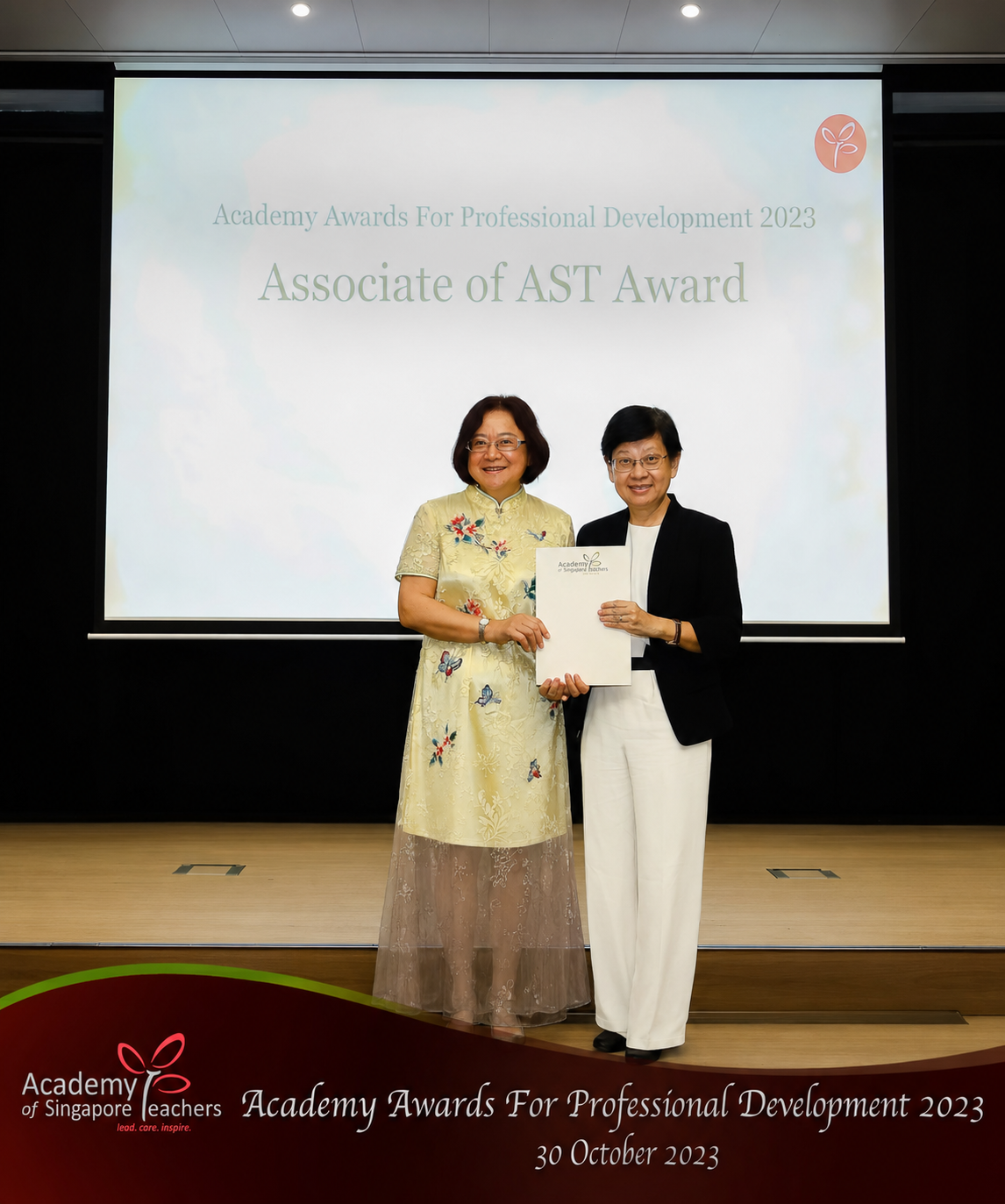 teacher receiving award